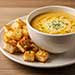 Bol de Soupe au Fromage et Croûtons Aillés